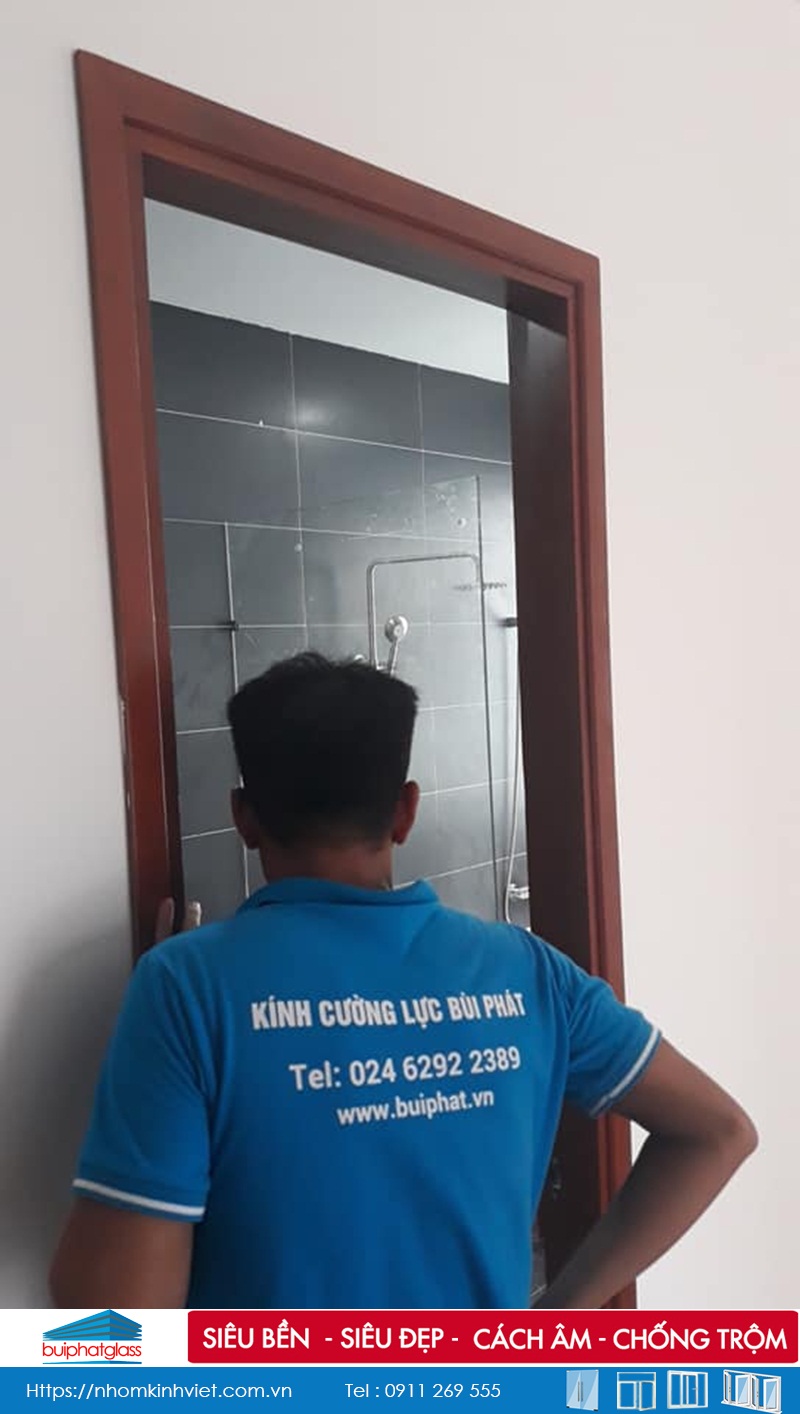 Lắp cửa kính lùa ray inox tròn D25 tại quận Vò Gấp, Tp HCM