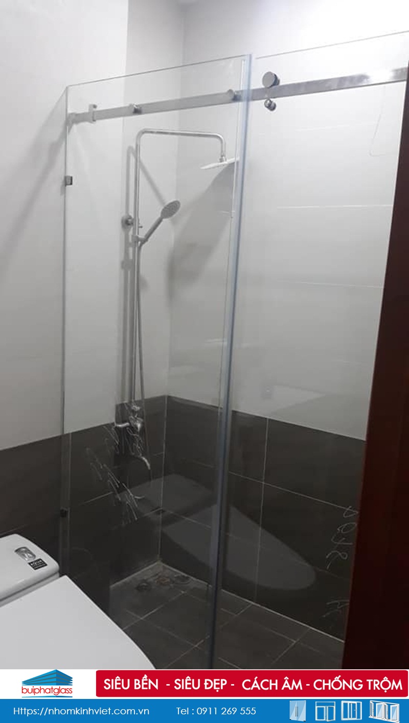 Lắp cửa kính lùa ray inox tròn D25 tại quận Vò Gấp, Tp HCM