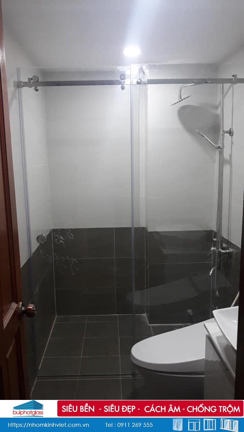Lắp cửa kính lùa ray inox tròn D25 tại quận Vò Gấp, Tp HCM